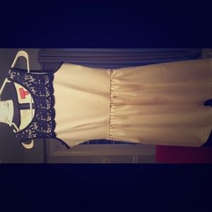 Women's off-white dress with black detail